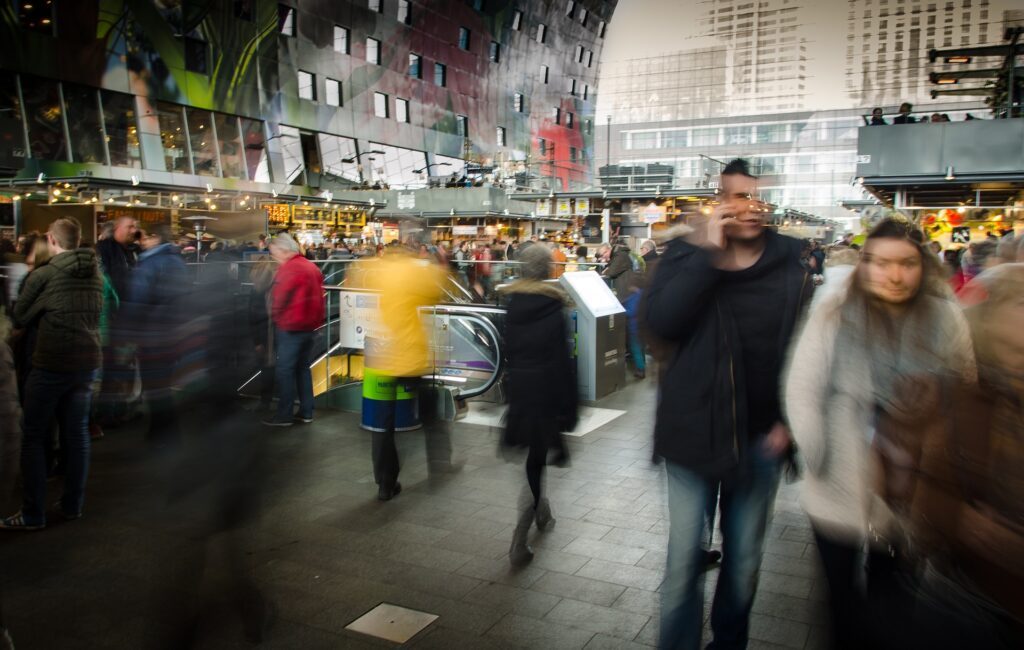 Crowd of blurred action and people in a shopping district